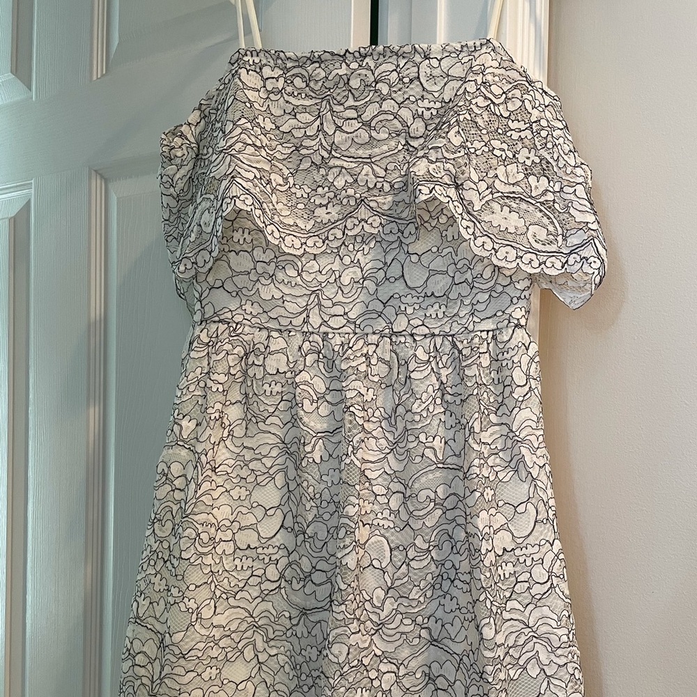 Francesca White and black lace dress